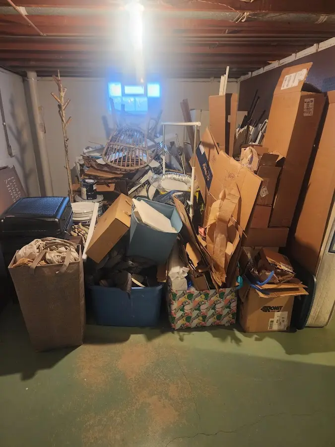 Roll-off dumpster container at job site for Roll Off Dumpster Rental in Wiggins